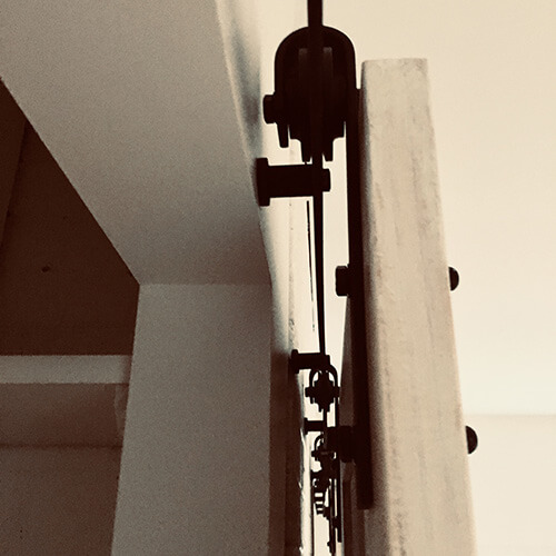 hanging door top hardware